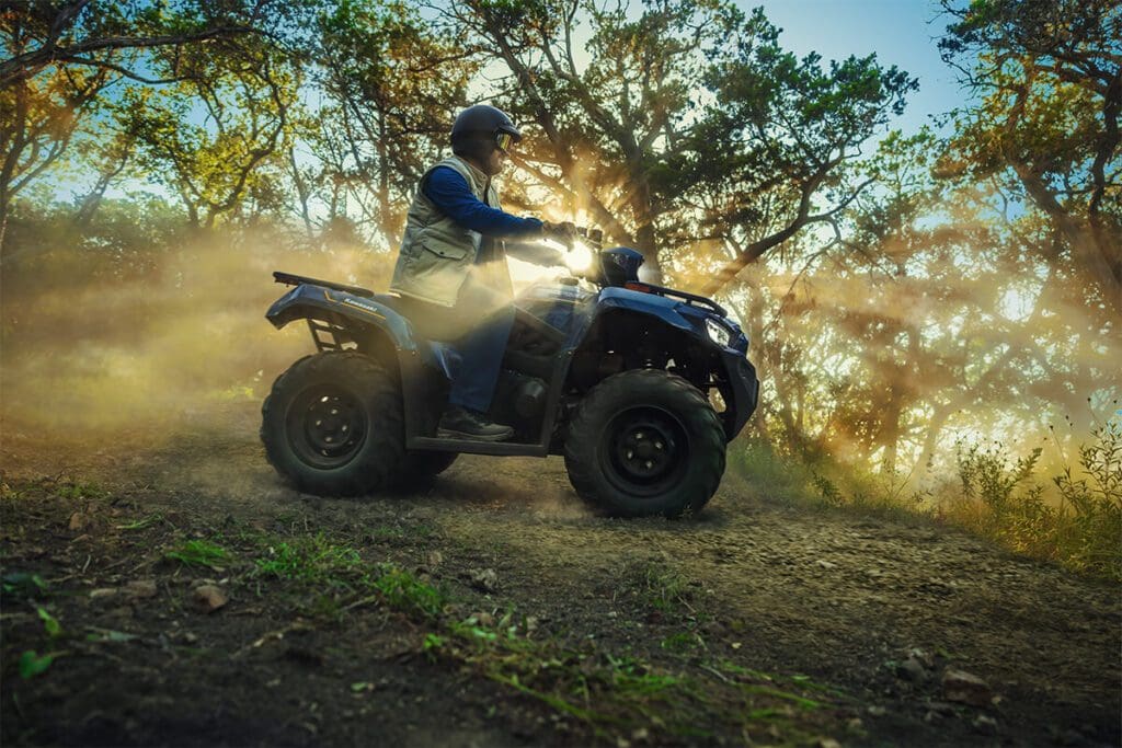 man driving kawasaki utv